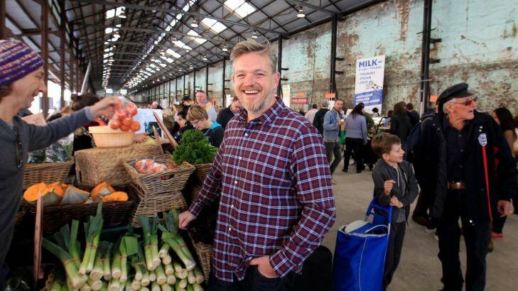 Engagement: Mike McEnearney enjoys the atmosphere at Carriageworks Farmers Market. Photo: James Alcock