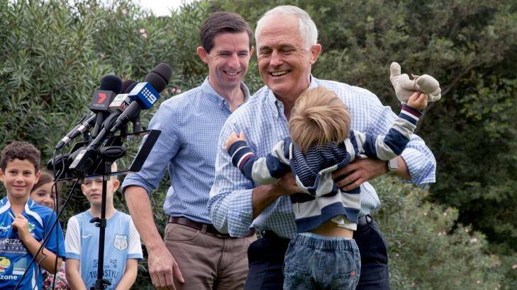 Prime Minister Malcolm Turnbull with grandson Jack Turnbull Brown and Education Minister Simon Birmingham in Double Bay. Photo: Edwina Pickles