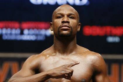 Floyd Mayweather jnr poses during his weigh-in in Las Vegas on Friday.  Photo: John Locher
