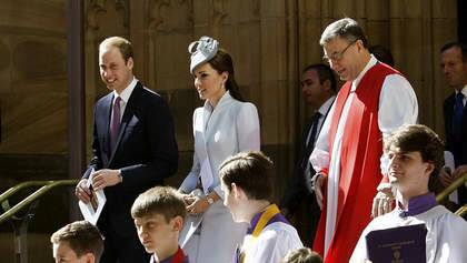 Britain's Prince William, center left, and his wife, Kate, the Duchess of Cambridge, center right, walk past members of the choir following an Easter Sunday service at St. Andrews Cathedral in Sydney. Photo: Lisa Maree Williams