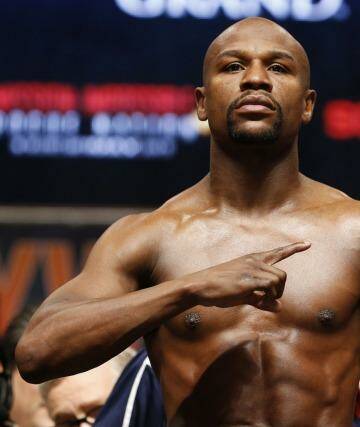 Floyd Mayweather jnr poses during his weigh-in in Las Vegas on Friday.  Photo: John Locher