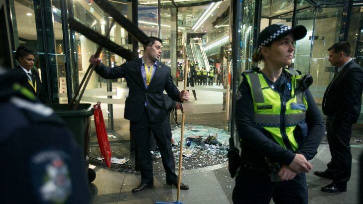 The clean-up following the protest  at the book launch of Christopher Pyne's new book.  Photo: Simon Schluter