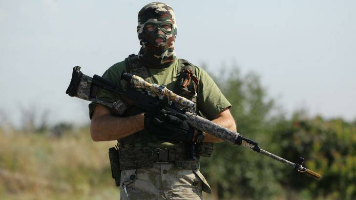 Pro-Russia rebel sniper 'Angel' at a checkpoint on the outskirts Shakhtersk on Thursday. Photo: Kate Geraghty
