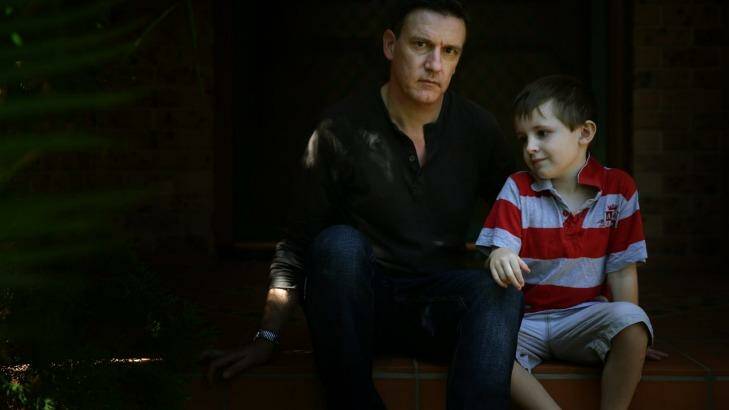 David Roy with his six-year-old son Fraser, who came home from school bruised.  Photo: Marina Neil 