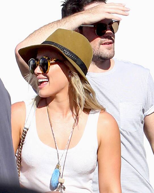 Hilary Duff does festival accessories perfectly, while hanging out with ex Michael Comrie Photo: eonline.com