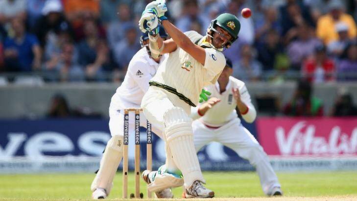 Lusty hitting: Mitchell Starc hits straight off a delivery from Moeen Ali. Photo: Michael Steele