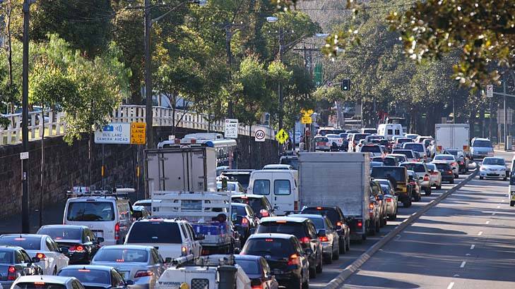 Life in the slow lane: Morning peak-hour traffic congestion on Broadway. New analysis shows traffic in the harbour city is the worst in the country. Photo: Peter Rae