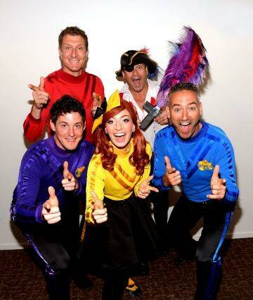 Wiggles Lachlan Gillespie (bottom left) and Emma Watkins (centre) have announced their engagement. Photo: Mark Davis