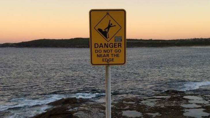 Danger sign on a headland at Maroubra Beach.  Photo: Facebook