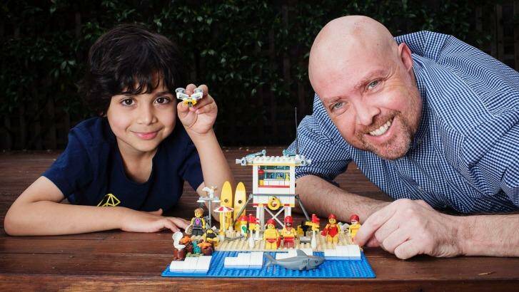 Damian MacRae and his son Aiden have created a "surf" Lego range to raise awareness about sun safety. Photo: Christopher Pearce