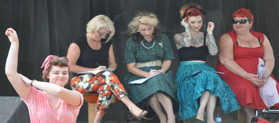 Judges Rhonda Nyquist and Stacey Pethers from PRD Nationwide, international model Cherry Dollface and Cat Hart from Catfight collections during the vintage/professional division of Sunday's best dressed parade. 