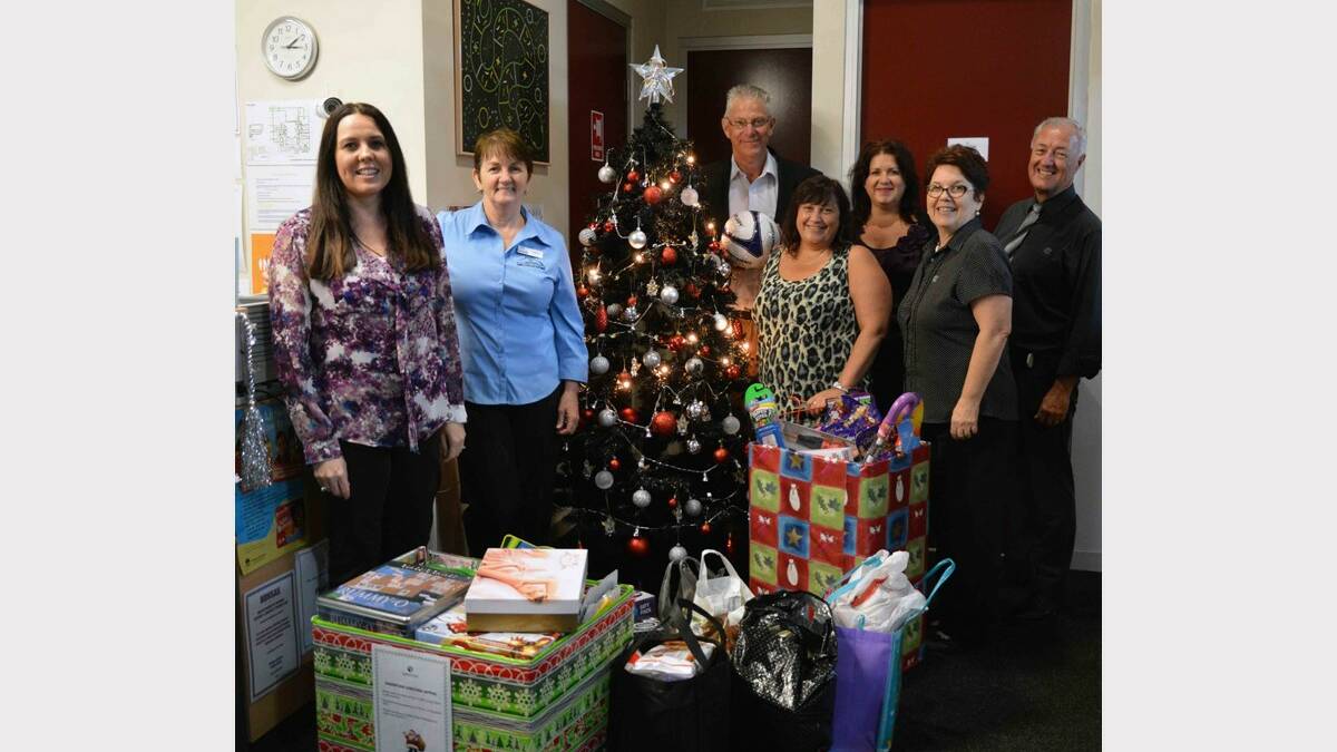 GENEROUS: Cessnock City Council and Samaritans representatives with the goods that council staff donated to the Christmas appeal.