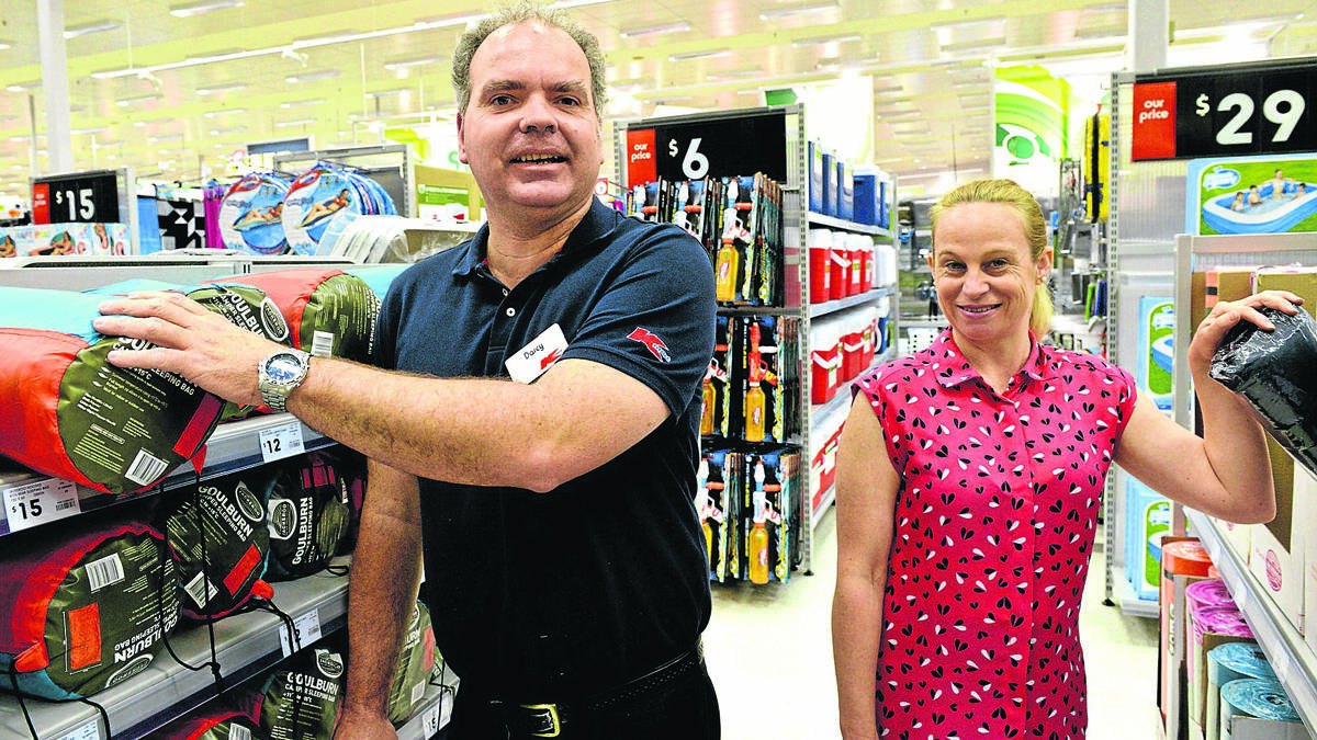 ACHIEVEMENT: Darcy Martin, of South Cessnock, has celebrated 25 years at Kmart Maitland. He is pictured with his supervisor Debbie Eagleton. Photo by Stuart Scott.