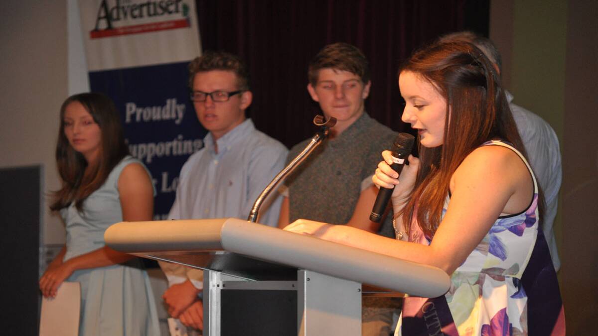 Miss Cessnock City, Allyra Robson, on stage with some of the junior nominees. 