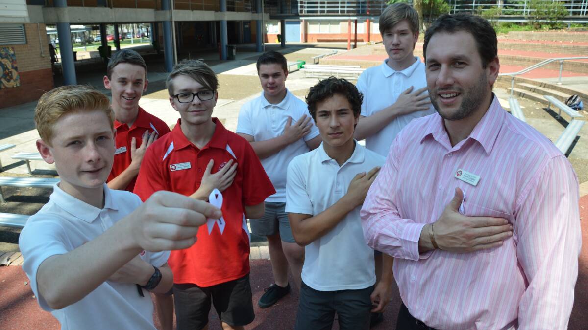 LEADING BY EXAMPLE: Mount View High School students Joe Stephenson, Matthew Parish, Bailey Lennard, Darryl Foster, Vincent Plater, Aiden Walker and wellbeing head teacher Steve Quigley have taken the White Ribbon oath.