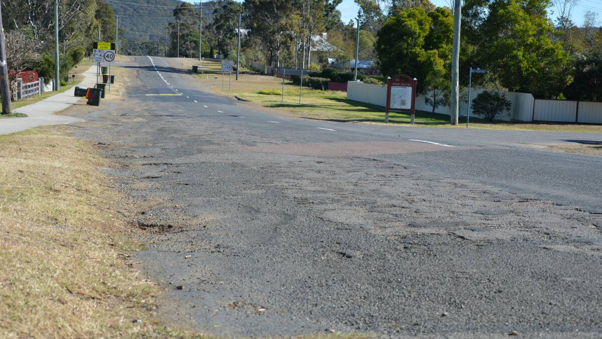 BUMPY: Wollowmbi Road at Millfield has been labelled a "disgrace."