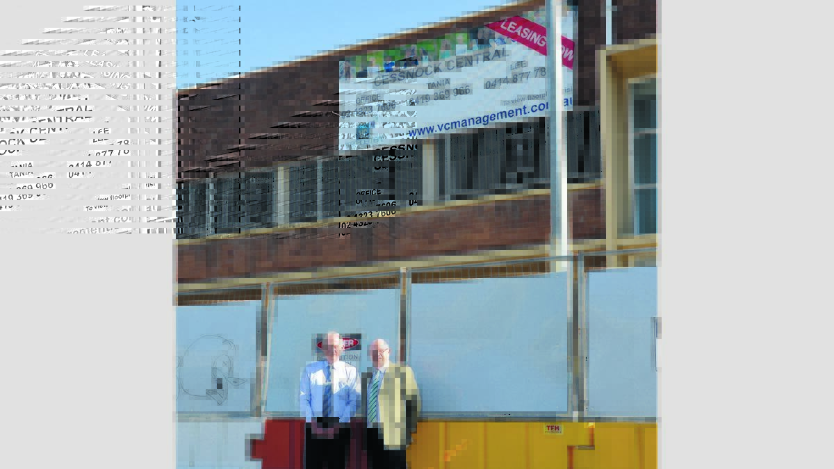 BUILDING: Cessnock Chamber of Commerce president Geoff Walker with VC Management CEO Lee Woodward at the front of Cessnock Central.