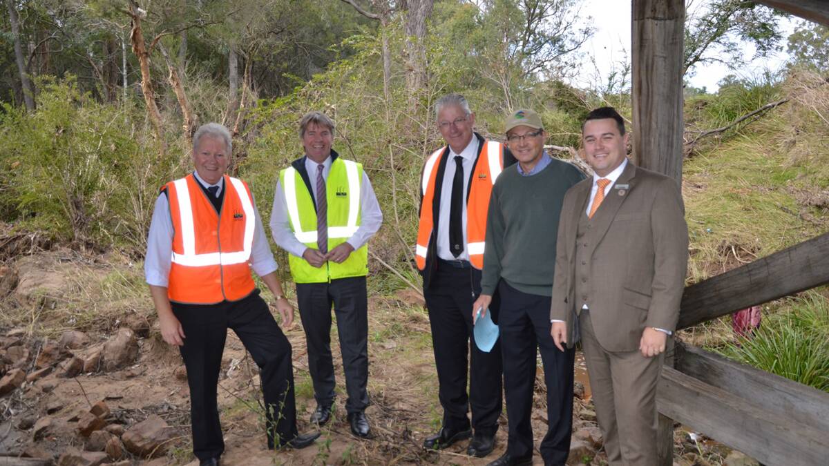 INSPECTION: Cessnock City Council general manager Stephen Glen, director of works and infrastructure Justin Fitzpatrick-Barr, Mayor Bob Pynsent, Parliamentary Secretary for the Hunter Scot MacDonald and Cessnock councillor Bryce Gibson at Frame Drive bridge on May 15.