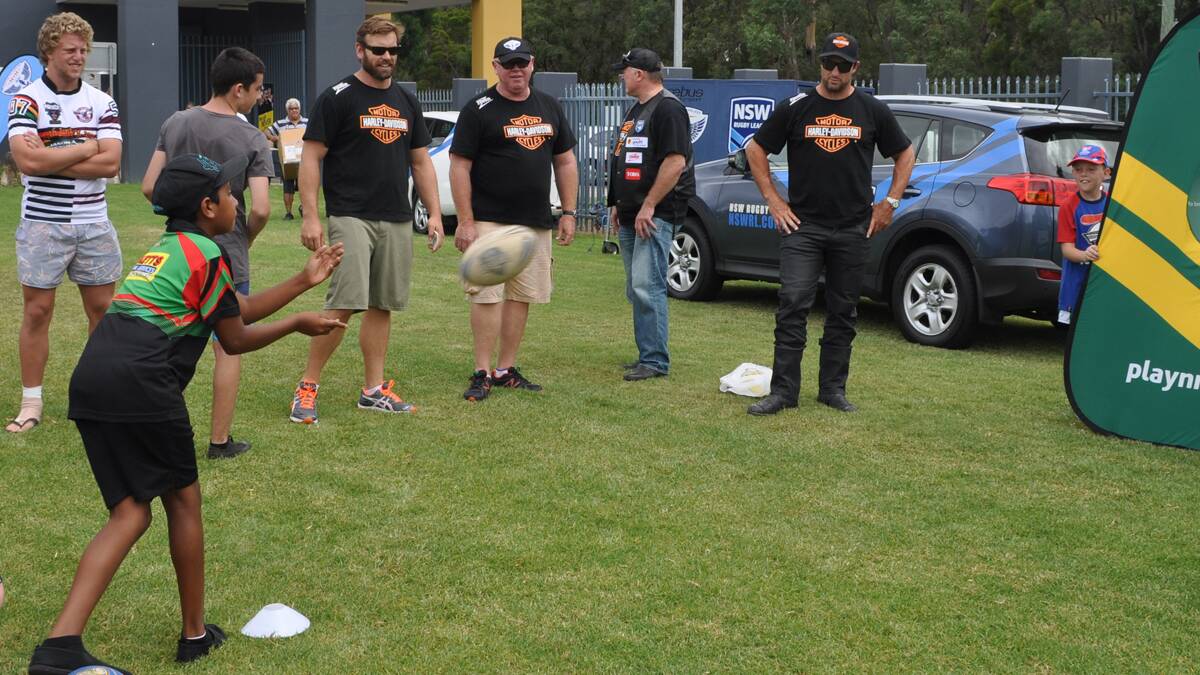 COACHING: Josh Perry and Nathan Hindmarsh lead a coaching clinic at Cessnock Sportsground.