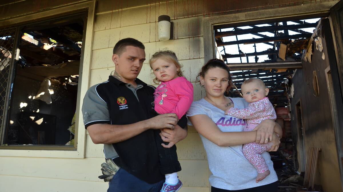 DEVASTATED: Brodie and Monique Duff and their daughters Cali and Addison, who escaped their Pelaw Main home just before it went up in flames on Saturday night.