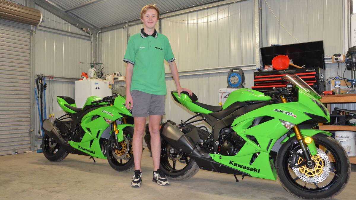 SHINY: Hayden Spinks with his new Ninja ZX6R 600cc bikes he is looking forward to riding after his 16th birthday in November.