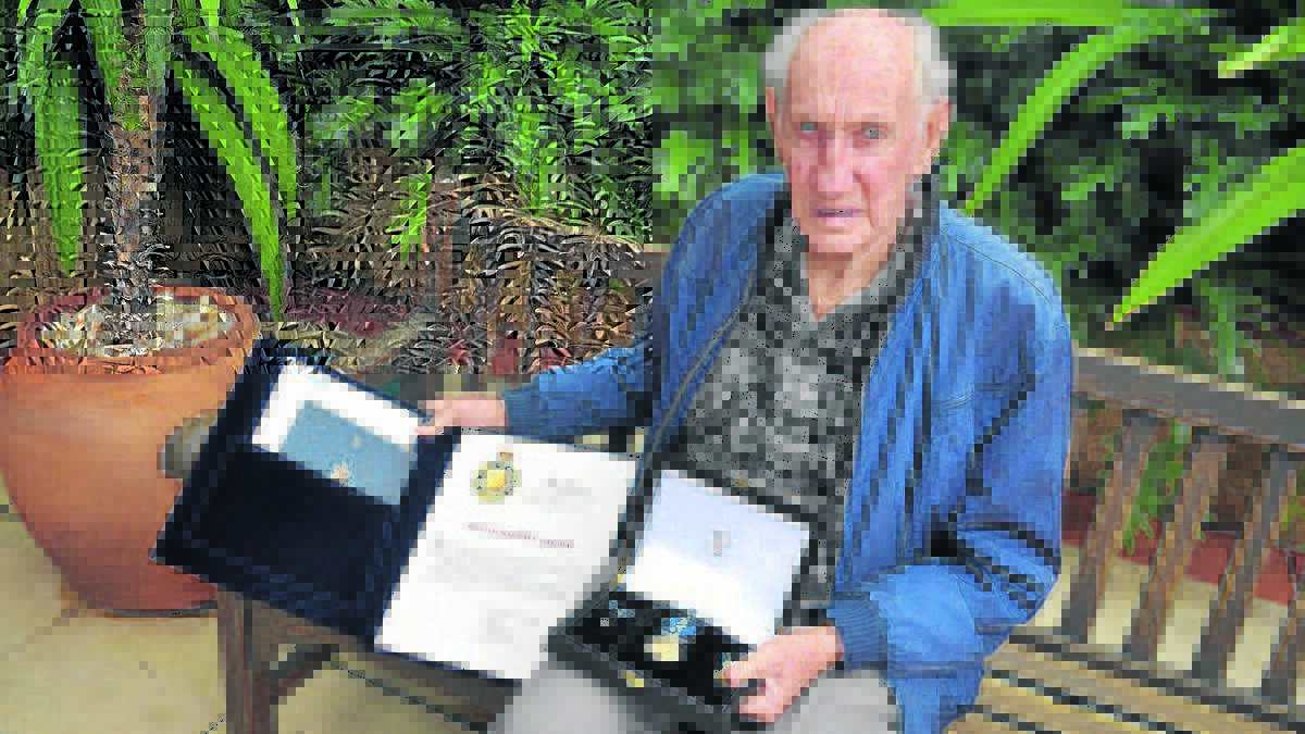 HONOUR: Bill Chapman with his Order of Australia Medal, pictured at the Northern District Mining and Energy Union office at Aberdare. Photo by Sage Swinton.