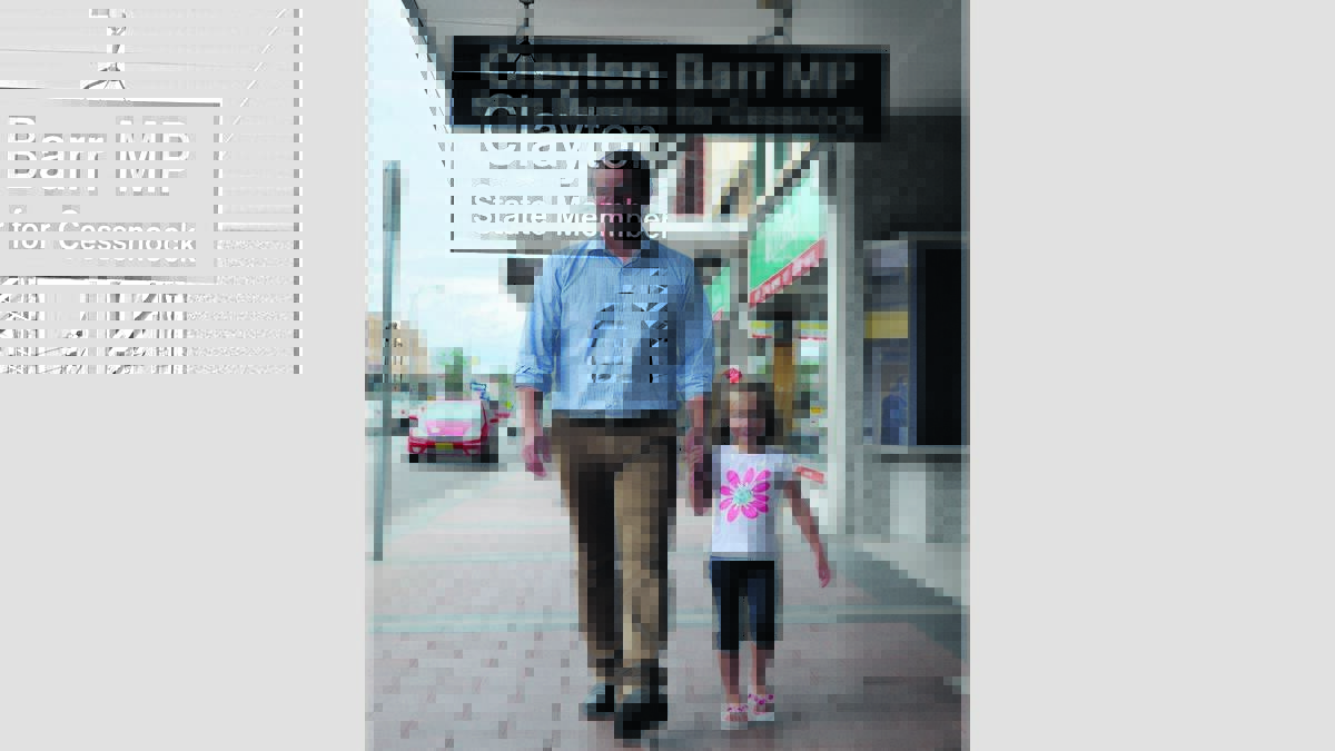 BACK TO WORK: Member for Cessnock Clayton Barr and his daughter Elsie, 4, in Vincent Street on Monday.