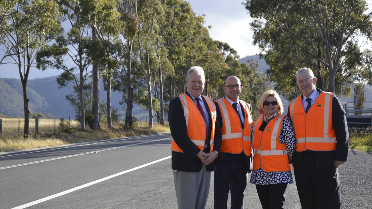 IMPROVEMENT: Cessnock City Council general manager Stephen Glen, The Nationals’ Duty MLC for Cessnock Trevor Khan, Roads and Maritime Services regional manager (Hunter) Anna Zycki and Cessnock Mayor Bob Pynsent at the recently-completed Broke Road (West) works. 