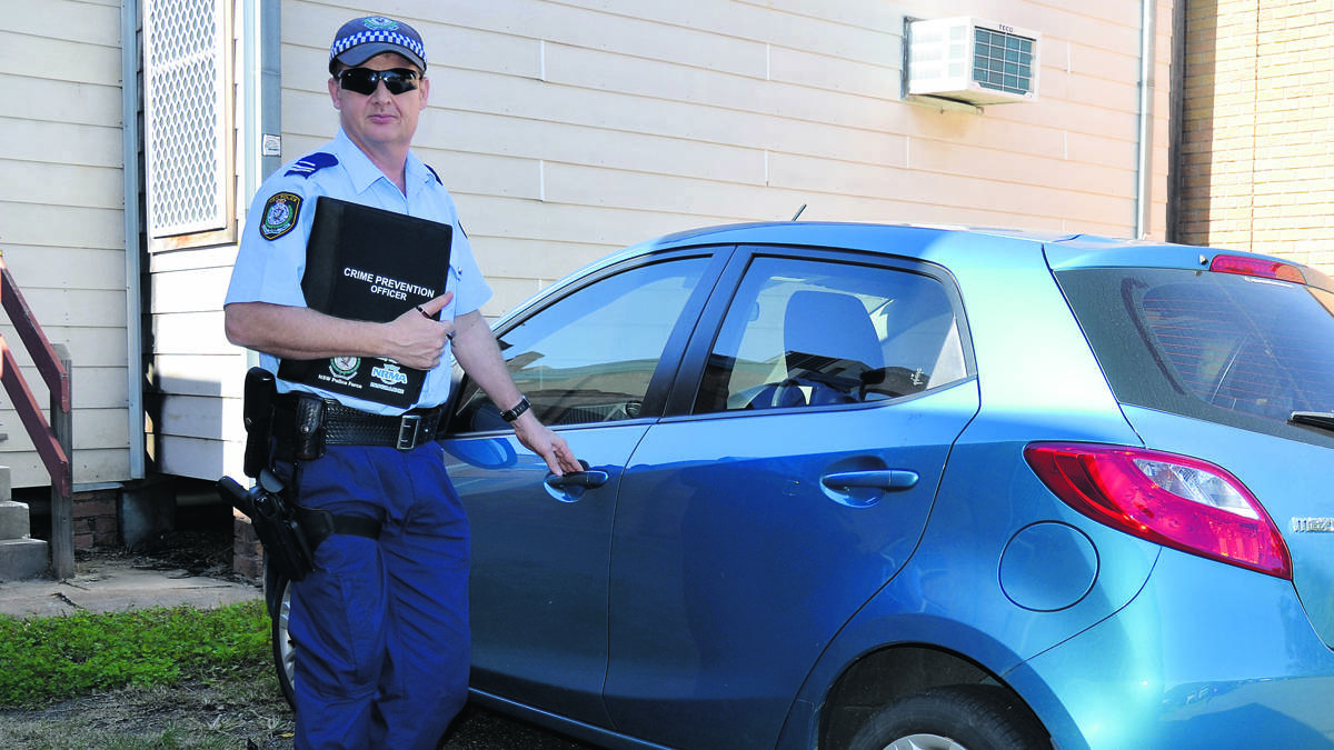 AWARENESS: Snr. Constable Kel Boak is promoting the Park Smarter campaign.