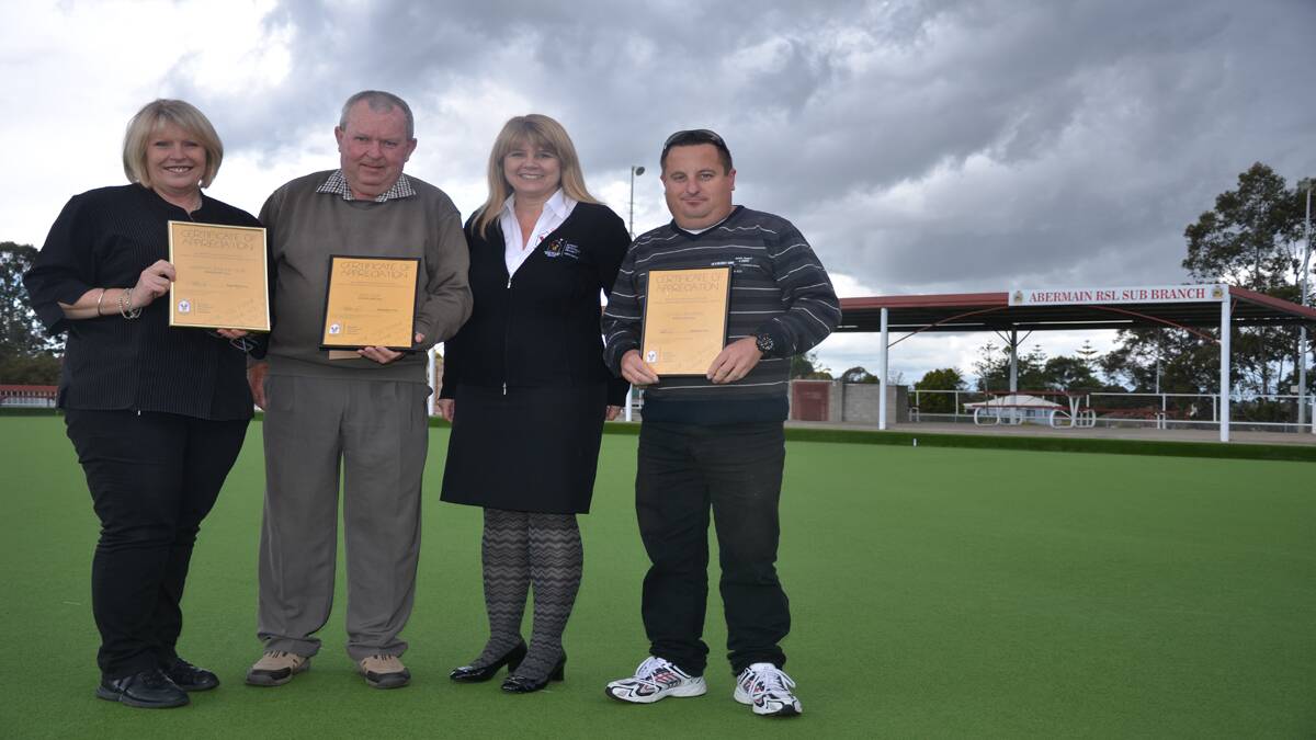 GREAT CAUSE: Abermain Bowling Club secretary manager Cathy Flegg, Ian Lewis, Rohan Bingham from Ronald McDonald House Newcastle and Clinton Mitchison, with their appreciation certificates. 