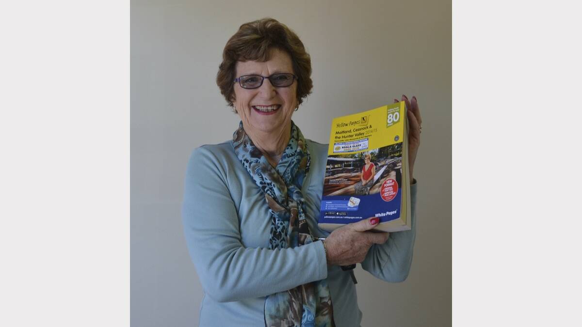 INSPIRING OTHERS: Cessnock's Sheila Turnbull appears on the cover of the 2014/15 Whit Pages and Yellow Pages.