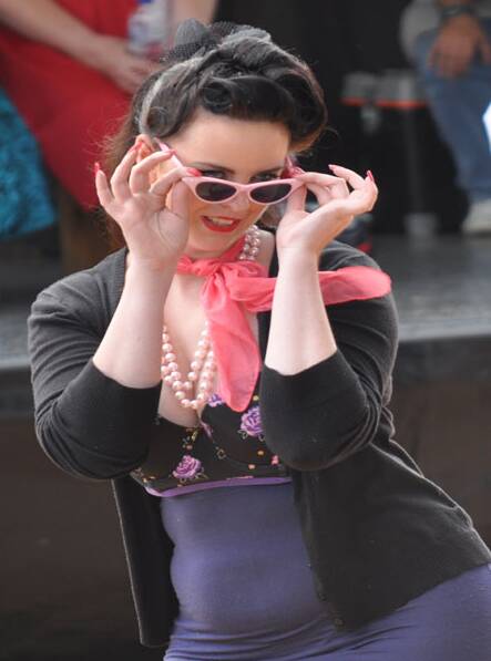 Rachel Smyth strikes a pose in the vintage/professional division of Sunday's best dressed parade. 