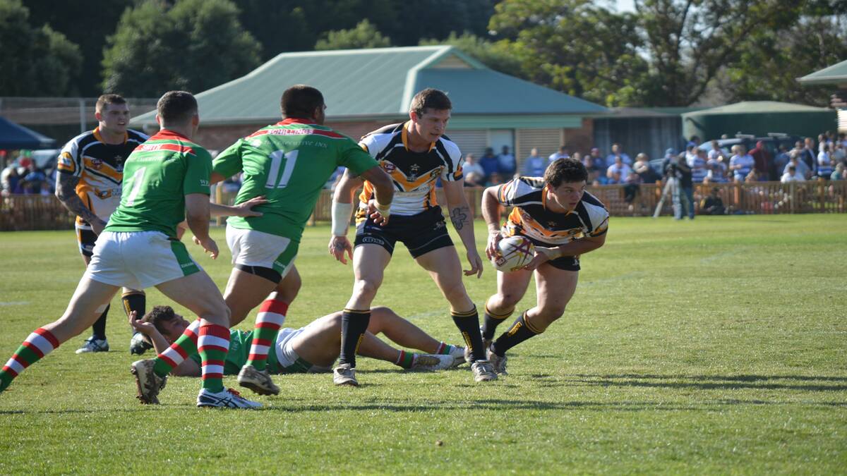 EFFORT: Geordie Connelly on his way to scoring the Goannas’ second try.