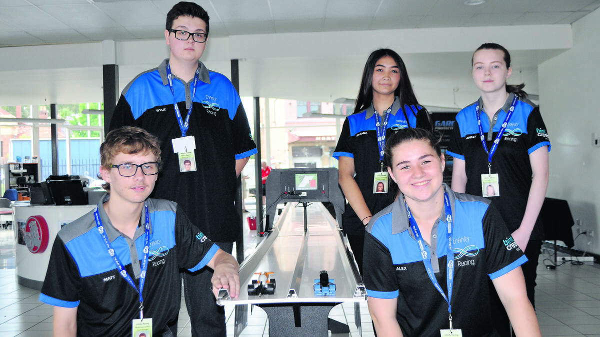 TEAM EFFORT: Mount View High School’s REA F1 in Schools team, Infinity Racing (back) Wylie Neville, Brianna Stothard and Ainsley Flett, and at front, Matthew Griffin and Alex Kemp. Photo by Cameron Abbott.
