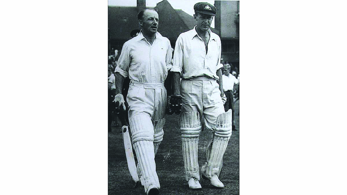 TEAMMATES: Don Bradman and Arthur Morris walking onto Leeds Cricket Ground in the fourth Test in 1948.