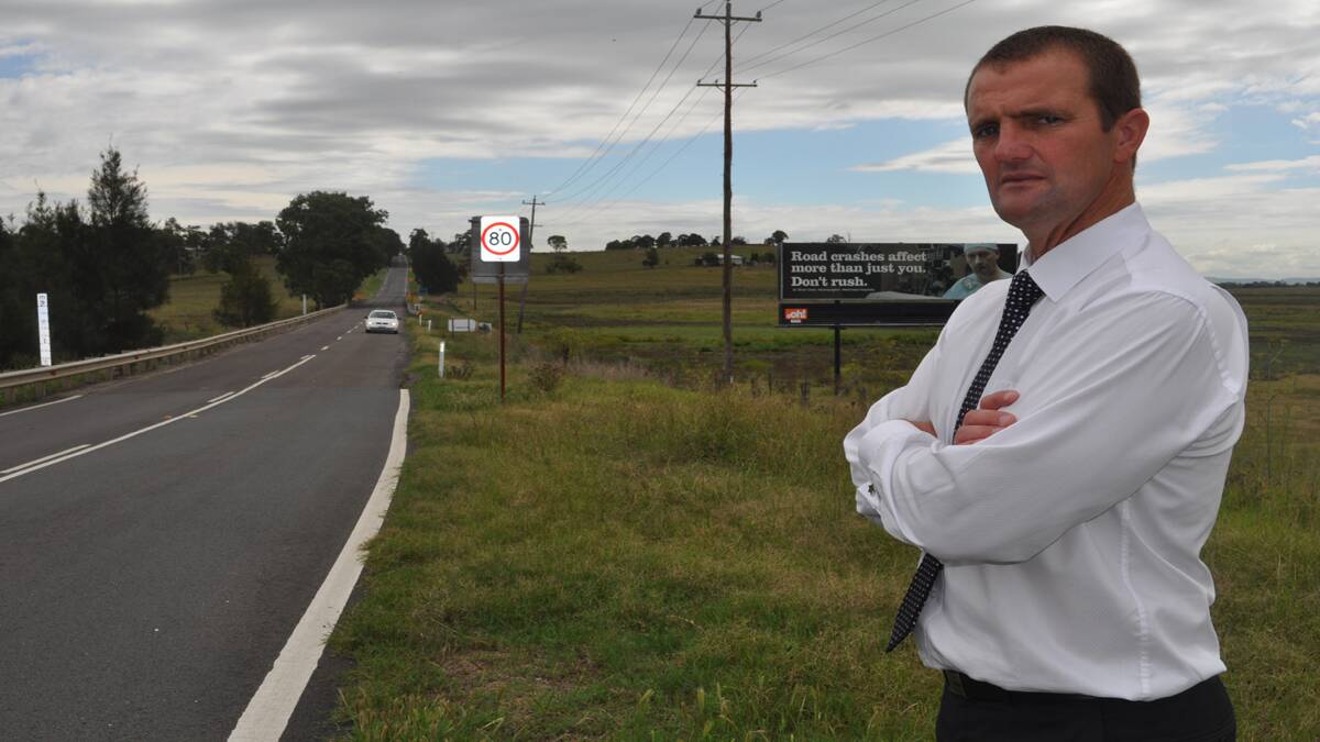 Member for Cessnock Clayton Barr said that the Minister for Roads is sitting on a report concerning flooding at Testers Hollow. 
