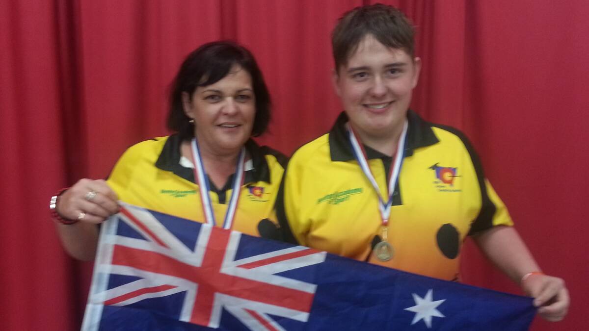 CHAMPIONS: Narelle and Janszen Cook brought home gold medals from the World Field Archery Championships.
