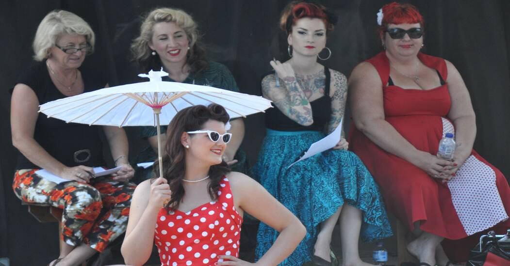 Judges Rhonda Nyquist and Stacey Pethers from PRD Nationwide, international model Cherry Dollface and Cat Hart from Catfight collections during the miss modern day division of Sunday's best dressed parade. 