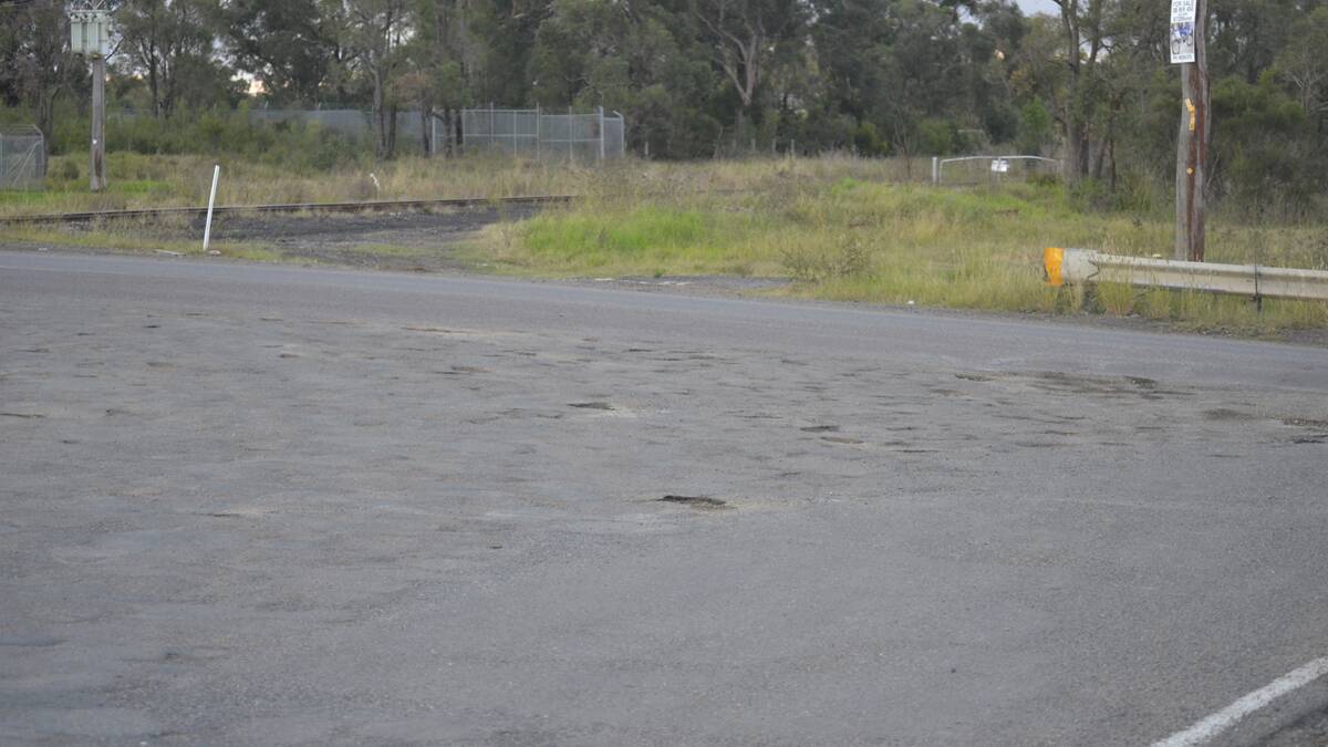 POOR STATE: The intersection of Mitchell Avenue and Railway Parade at Kurri is just one example of a Cessnock road that is in desparate need of repair.