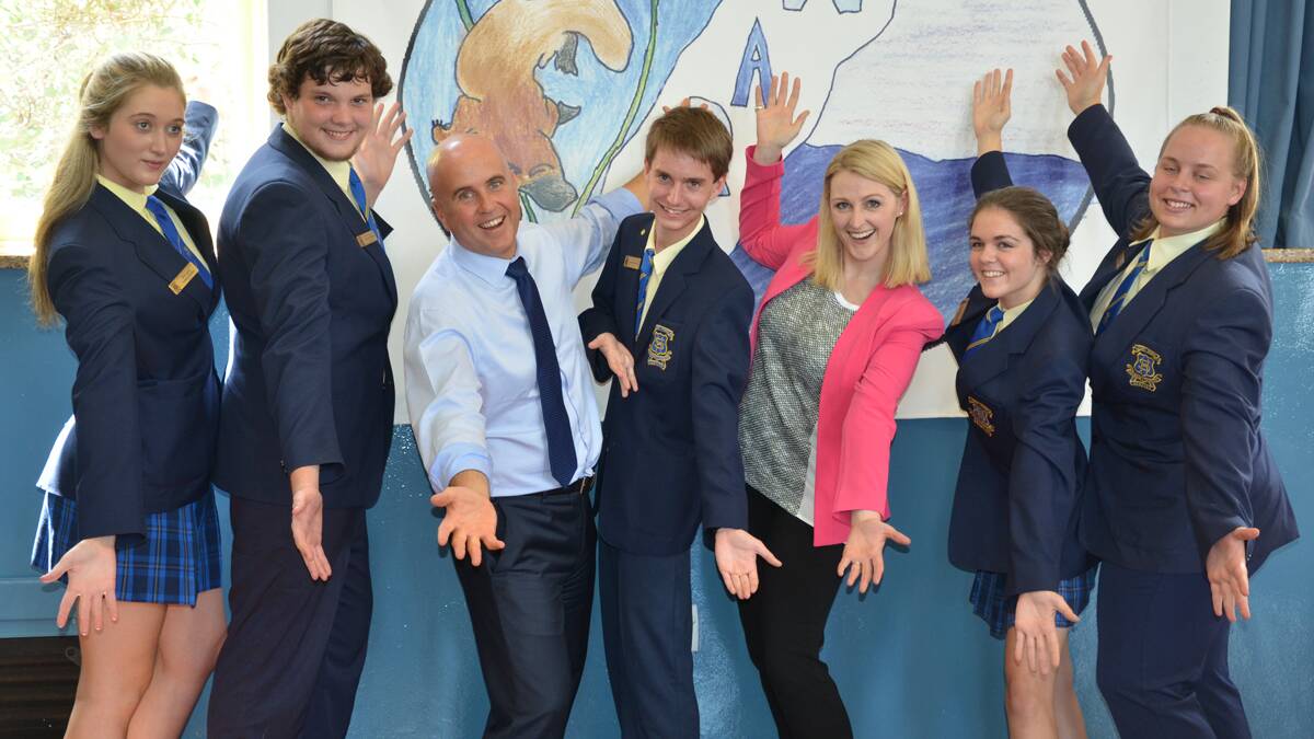 TA-DA: NSW Minister for Education Adrian Piccoli (third from left), and Nationals candidate for Cessnock Jessica Price-Purnell (third from right) with Kurri High School students Sheridan Lewis, Zigmund Davies, Aden Wyborn, Kali Somerville and Aimee Simon.
