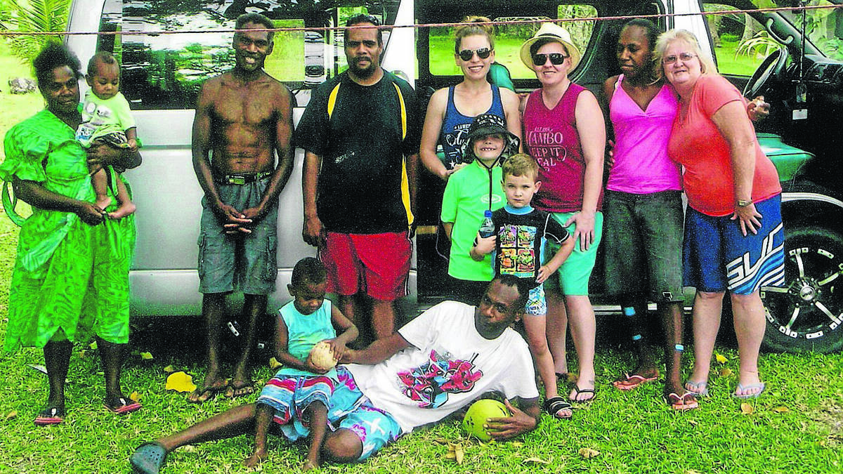SUPPORT: Deb Goodwin (far right), and her daughter Tara (third from right) and her partner Inga (fourth from right) and sons Owen and Levi, with Hollem Village residents Cilla (second from right), Mirian, Jack, Jeffrey, Karl, and at front Matthew and Arthur.