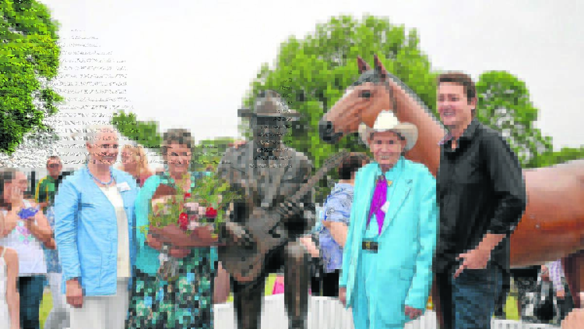 TRIBUTE: Pictured at the Reg Lindsay bronze statue unveiling at East Cessnock Bowling Club on March 8, 2015, sculptor Tessa Wallis, Reg Lindsay's widow Ros and country music legends Chad Morgan and Adam Harvey, who did the unveiling. Photo by Krystal Sellars, The Advertiser.