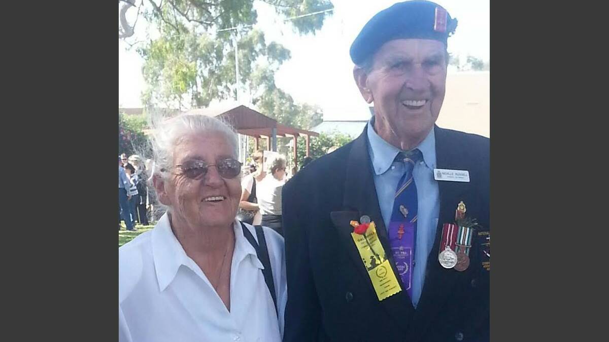 MILESTONE: Colleen and Neville Russell at a recent Remembrance Day ceremony, and below, on their wedding day in 1955.