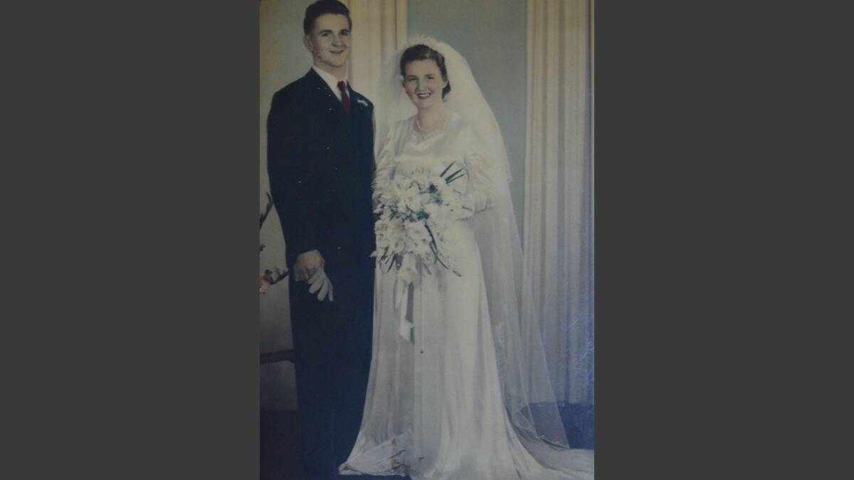 LOVE: Neville and Colleen Russell on their wedding day in 1955.