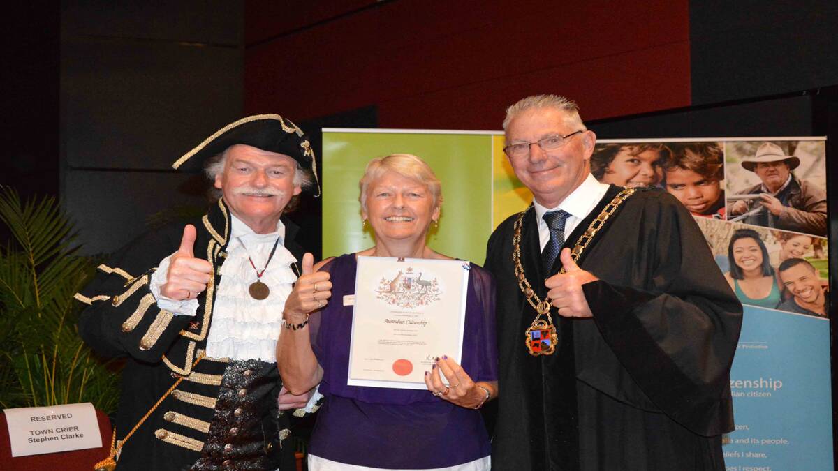 PROUD: Town crier Stephen Clarke, new citizen Monica Worton and Cessnock Mayor Bob Pynsent at the citizenship ceremony.