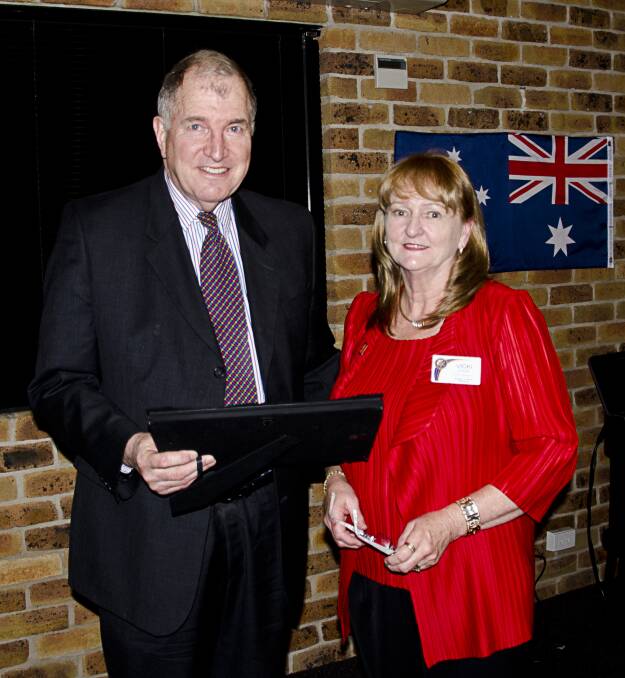 AWARD: Cessnock Rotary Club president Vicki Steep presented Royal Oak Hotel owner John Harvey with an Innovation and Excell­ence Award at the club’s changeover dinner.