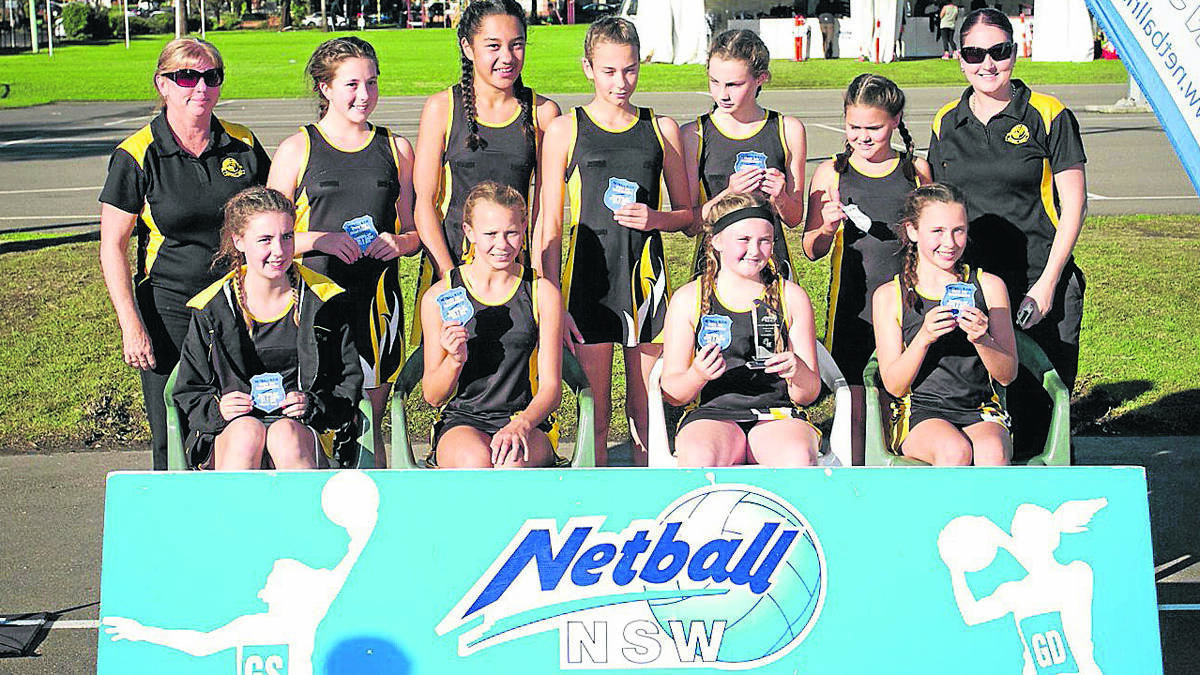 JULY - The Cessnock under-12 netball team is a team finalist after they finished runners-up in the division three at the 2013 Netball NSW State Age Championships. Photo courtesy of SMP Images.