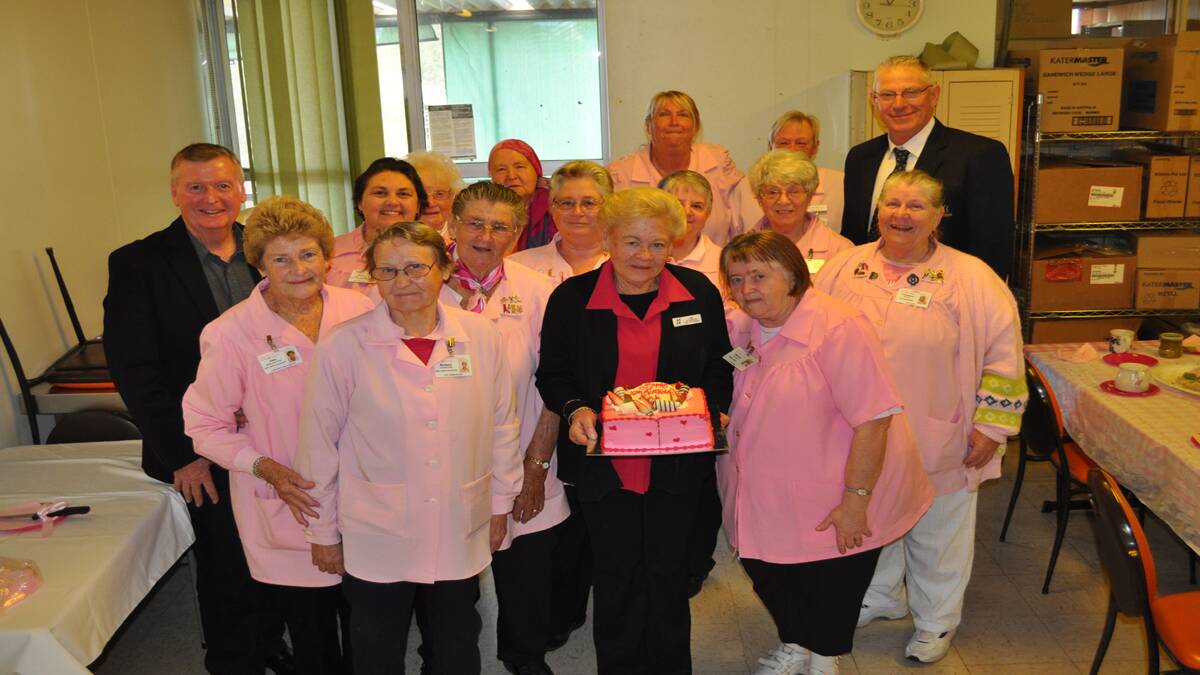 BIRTHDAY: Members of the Cessnock Pink Ladies with former director of nurses at Cessnock Hospital Alan Baird (left) and Cessnock Mayor Bob Pynsent (right). See more photos below. 