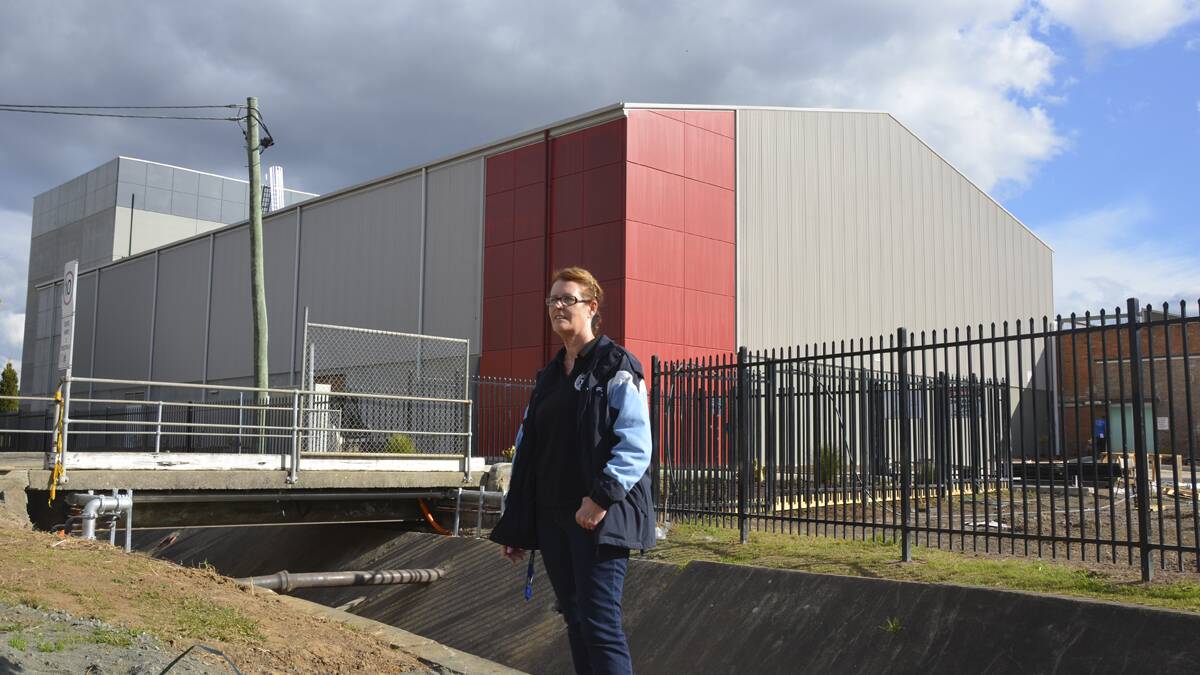 TAKING SHAPE: Cessnock PCYC manager Kathy Smith at the club’s new site, the former Bonds factory in Short Street