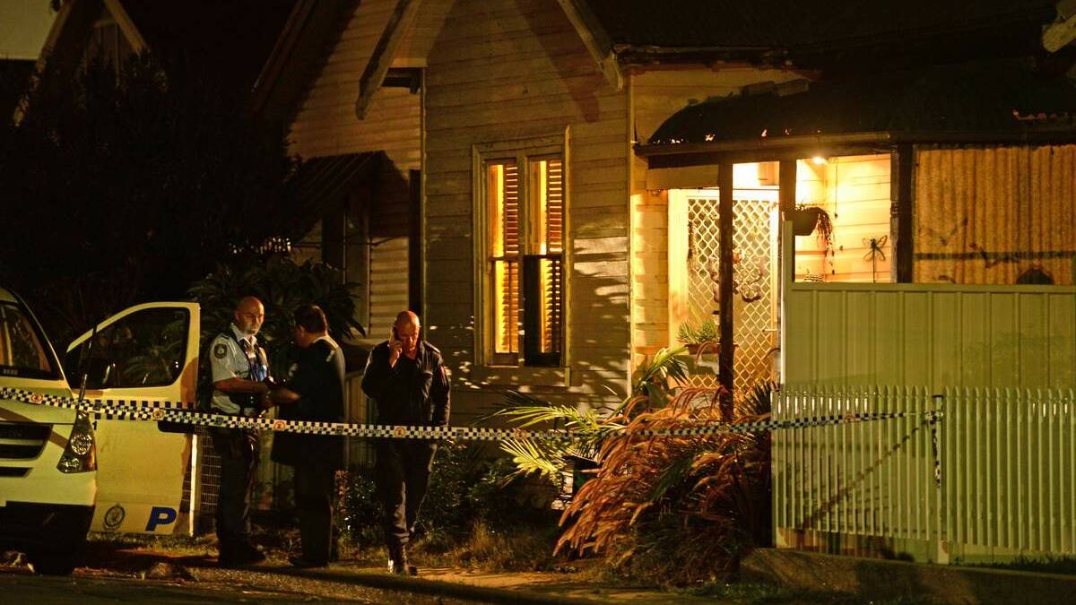 ROPED OFF: Police examine a property in Mayfield.